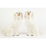 PAIR OF STAFFORDSHIRE POTTERY LARGE MODELS OF MANTLE DOGS, each of typical form with gilt splashed