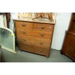 A LATE VICTORIAN OAK CHEST OF DRAWERS