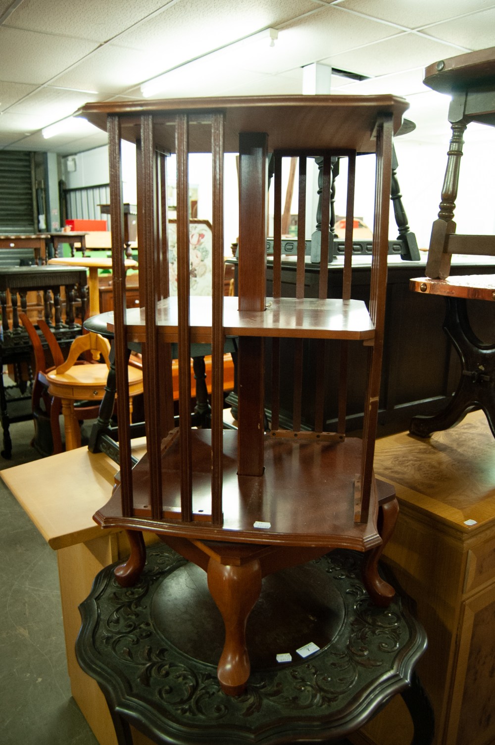 A REVOLVING BOOKCASE AND A MODERN LIGHT WOOD SIDEBOARD, HAVING THREE CENTRAL DRAWERS AND CUPBOARDS - Image 2 of 2