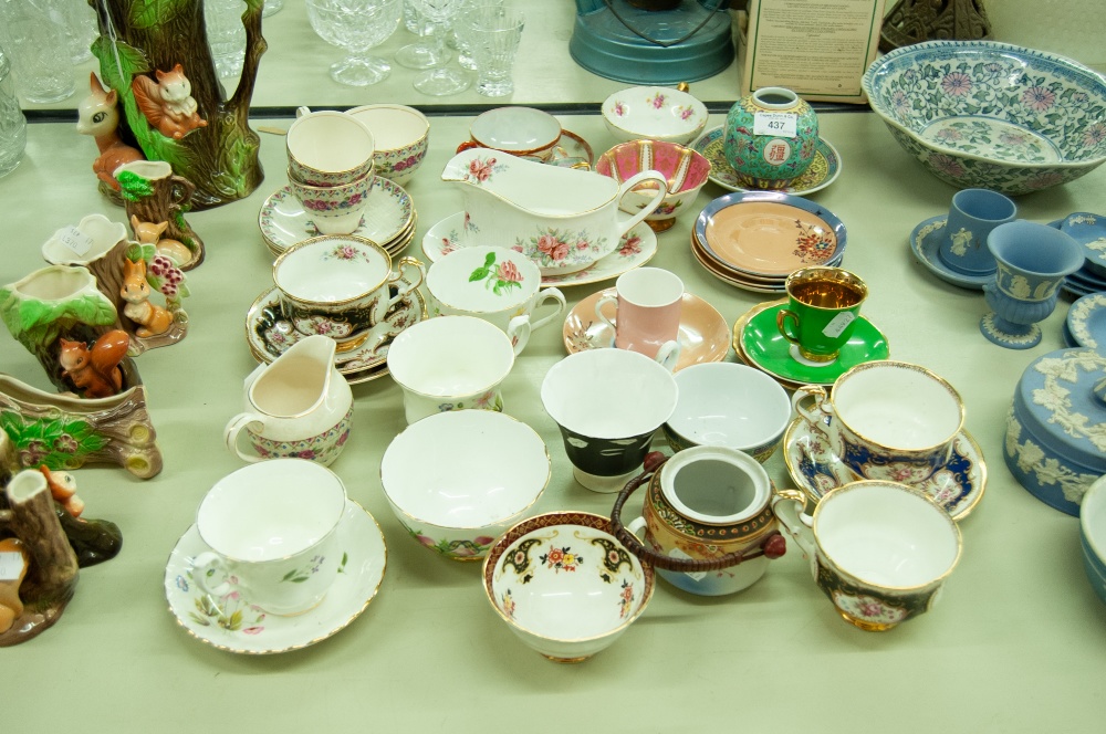 A SELECTION OF CUPS AND SAUCERS, OTHER ORIENTAL ITEMS, A MILK JUG AND STAND ETC.....