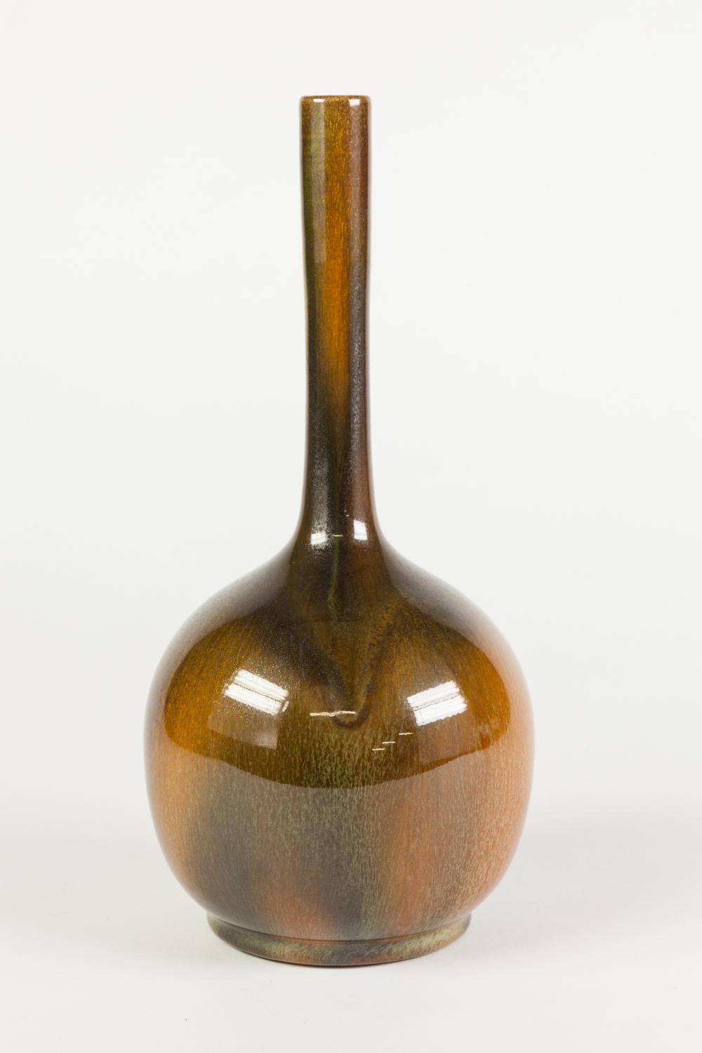 POSSIBLY BRETBY, EARLY TWENTIETH CENTURY ART POTTERY VASE, of globe and shaft form, crystalline