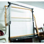 A MODERN CHROME CLOTHES RAIL AND A MODERN WEAVING FRAME (2)