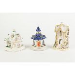 THREE NINETEENTH CENTURY AND LATER STAFFORDSHIRE POTTERY COTTAGE PATTERN PASTILLE BURNERS, all