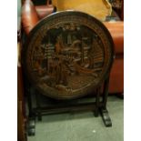 A MODERN ORIENTAL HIGH RELIEF CIRCULAR TABLE, FEATURING A NAUTICAL SCENE AND FOLIAGE, ON FOUR