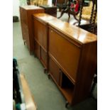 A CIRCA 1970's TEAK COCKTAIL CABINET, ANOTHER TEAK COCKTAIL CABINET AND A TEAK BUREAU (3)