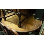POSSIBLE ITALIAN INLAID CIRCULAR DINING TABLE WITH TURNED COLUMN AND QUARTETTE SCROLL SUPPORTS AND