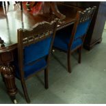 A PAIR OF OAK DINING CHAIRS WITH PADDED SEATS AND BACKS AND ANOTHER DINING CHAIR (3)