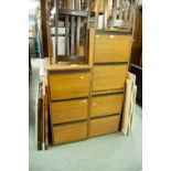 A TEAK FINISH THRE DRAWER FILING CABINET AND TWO TWO-DRAWER DITTO (3)