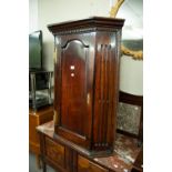 A NINETEENTH CENTURY JACOBEAN REVIVAL OAK CORNER CUPBOARD WITH STEPPED CORNICE OVER CHAMFERRED