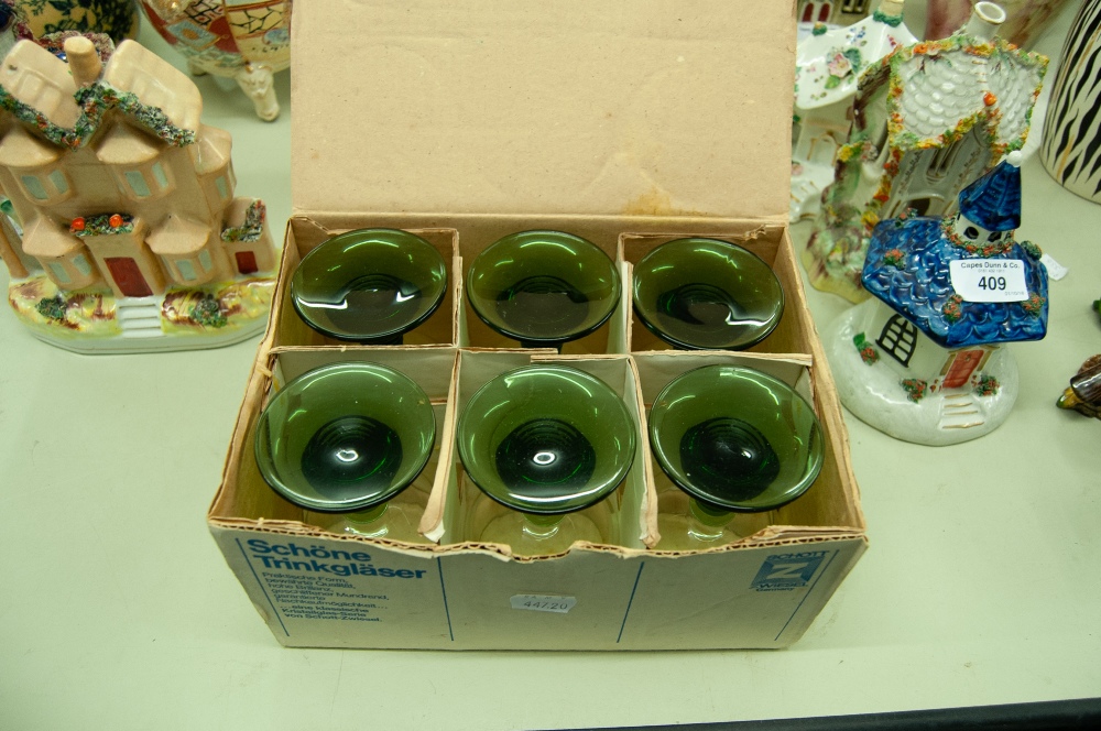 A SET OF SIX SCHOTT ZWEISEL GLASS WITH GREEN BASES