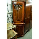 AN EARLY TWENTIETH CENTURY BEECHWOOD BOW FRONTED LOW CABINET, ALSO A REPRODUCTION YEW TREE WOOD