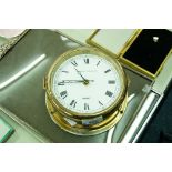 A BRASS 'SHIPS CLOCK' BY LONDON CLOCK CO., WITH QUARTZ MOVEMENT