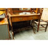 A REPRODUCTION FIGURED WALNUTWOOD SOFA TABLE WITH TWO FRIEZE DRAWERS, ON TRIPLE TURNED END