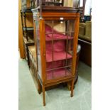 AN EDWARDIAN INLAID MAHOGANY DISPLAY CABINET