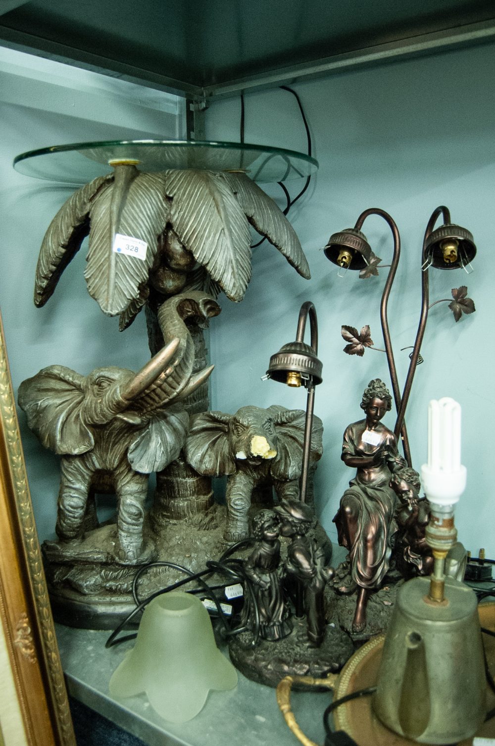 BRONZED METAL AND COMPOSITION TWIN LIGHT FIGURAL TABLE LAMP, ANOTHER SINGLE LIGHT, AND AN ELEPHANT