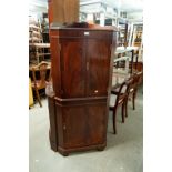 A REPRODUCTION CORNER COCKTAIL CABINET