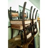 A SET OF FOUR MAHOGANY DINING CHAIRS, WITH OVERSTUFFED SEATS, RAIL AND CUSHION BACK SUPPORTS