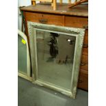 AN OBLONG BEVELLED EDGE WALL MIRROR IN GREY MOULDED FRAME, APPROX 36" X 27"