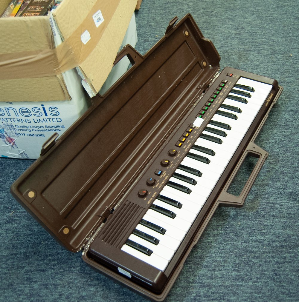 A YAMAHA PORTA SOUND KEYBOARD