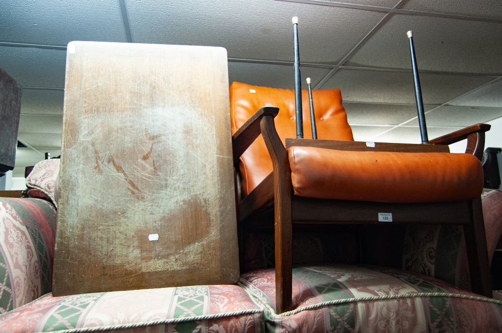 1960's TEAK OBLONG COFFEE TABLE ON EBONISED SUPPORTS AND A 1960S ARMCHAIR AND A TRIANGULAR COFFEE