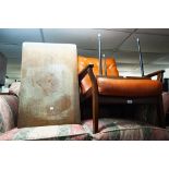 1960's TEAK OBLONG COFFEE TABLE ON EBONISED SUPPORTS AND A 1960S ARMCHAIR AND A TRIANGULAR COFFEE