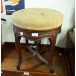 A TWENTIETH CENTURY CIRCULAR STOOL, with twist adjustable pad seat