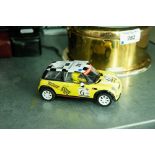 HORNBY (MADE IN CHINA) BATTERY OPERATED PLASTIC MODEL OF A MINI COOPER, 4 1/2" LONG