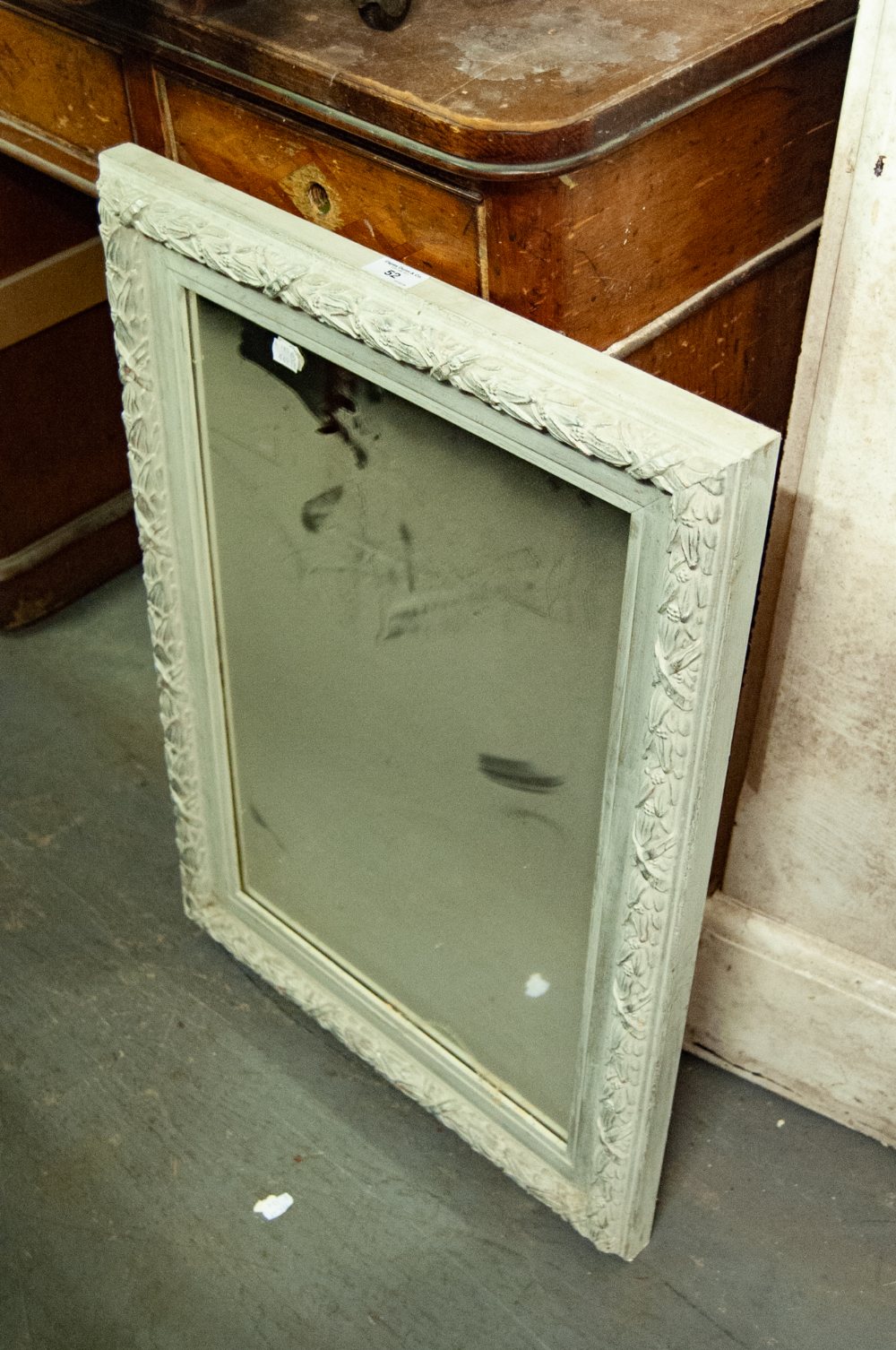 AN OBLONG BEVELLED EDGE WALL MIRROR, IN GREY MOULDED FRAME