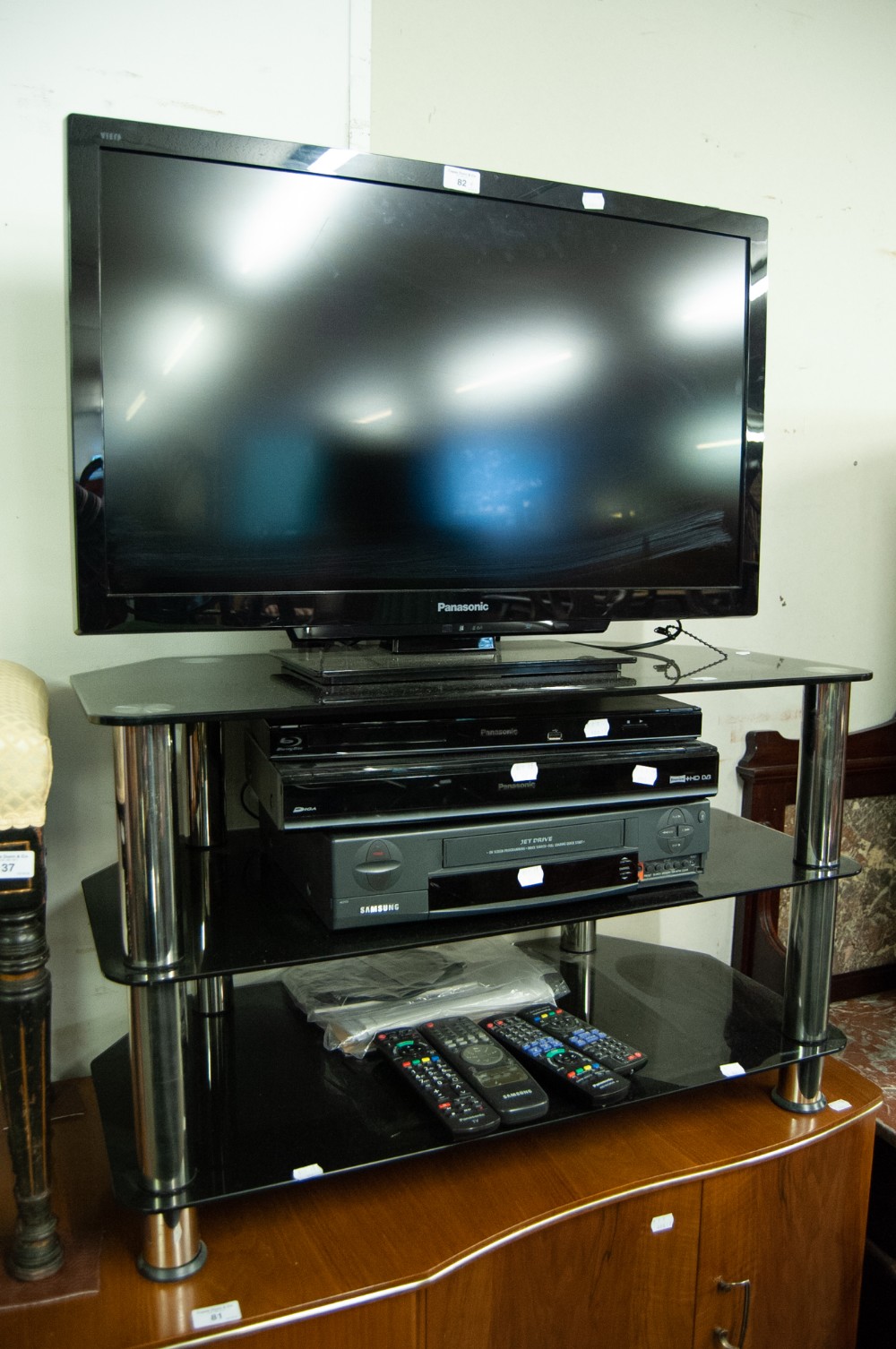 A PANASONIC FLAT SCREEN COLOUR TELEVISION, A RECORDER, VIDEO TAPE PLAYER AND A BLUE-RAY DISC