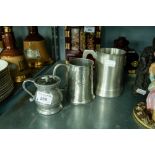 A PEWTER TANKARD, HALF PINT TANKARD AND SHAKER (3)