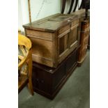 A SMALL OAK BLANKET BOX WITH TWO PANEL FRONT, AND ANOTHER BLANKET BOX