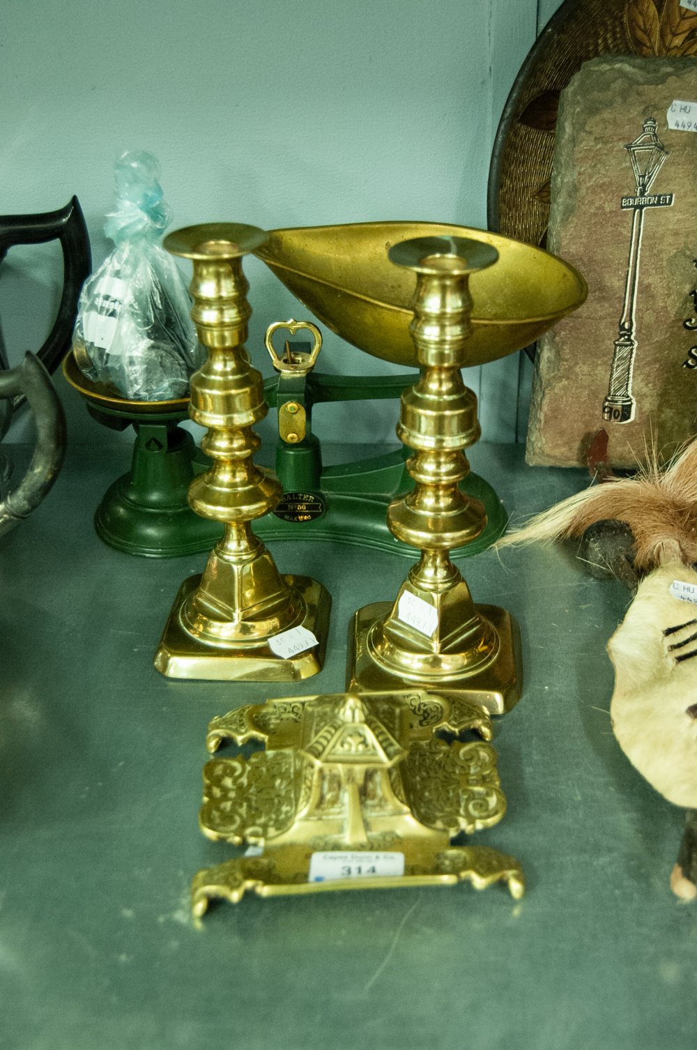 A SET OF SALTERS NO. 56 SCALES, WITH WEIGHT, A PAIR OF BRASS EJECTOR CANDLESTICKS AND A BRASS