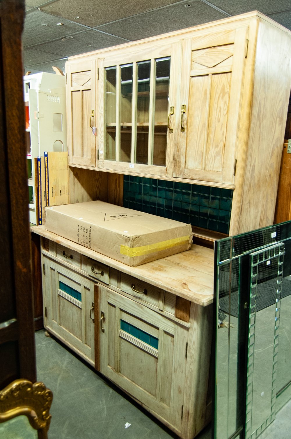 A PINE LARGE DRESSER WITH GREEN TILE FEATURES, HIGH RAISED CUPBOARD BACK