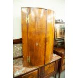 VICTORIAN OAK BOW FRONTED CORNER CUPBOARD WITH SOLID DOORS (LACKING CORNICE)