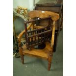 A VICTORIAN HARDWOOD COMMODE ARMCHAIR AND A STAINED WOOD PERIODICAL RACK