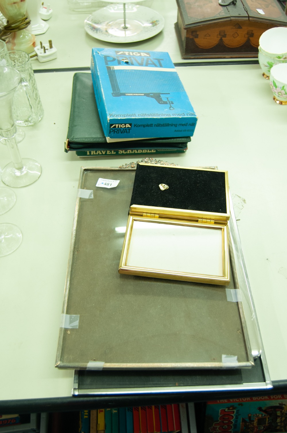 THREE EASEL PHOTOGRAPH FRAMES AND A TRIPTYCH FRAME (4) AND 3 BOXED GAMES