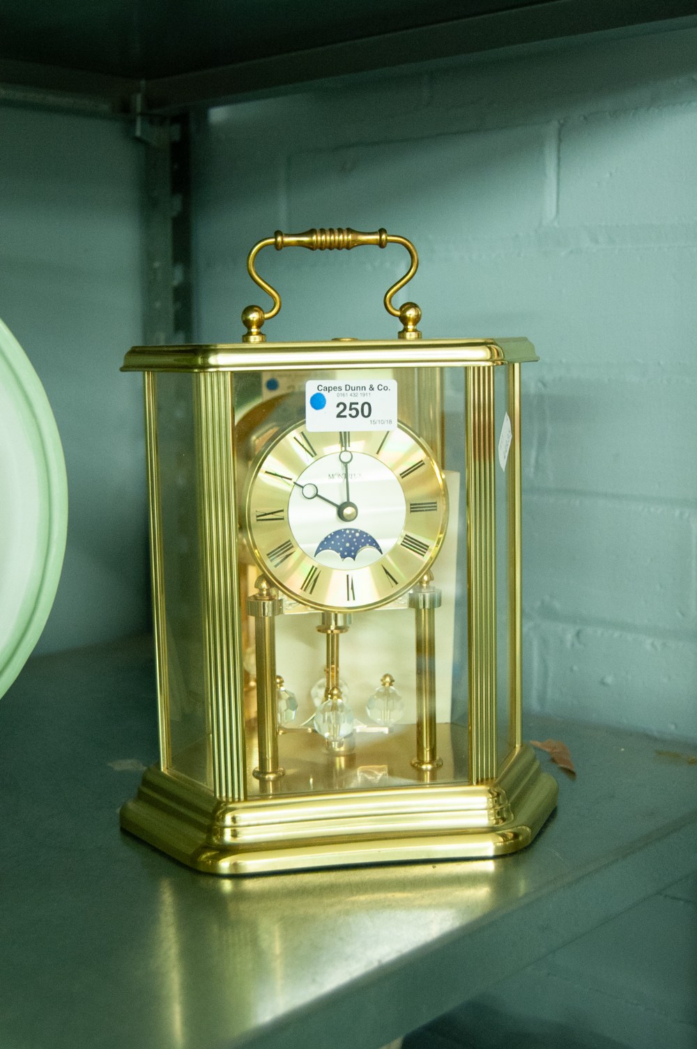 A MODERN BRASS CASED MONTREUX ANNIVERSARY CLOCK