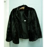 A BLACK MINK SHORT EVENING JACKET