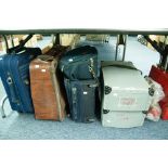 FOUR SUITCASES AND VANITY CASES AND A QUANTITY OF CHRISTMAS DECORATIONS AND A CHRISTMAS TREE