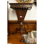 A LATE VICTORIAN BEECHWOOD TRIPOD SEWING TABLE