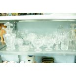 A COLLECTION OF CUT GLASS AND CRYSTAL GLASSES, VASES, DECANTERS, GRAPEFRUIT BOWLS ETC.....