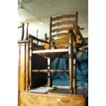 A PAIR OF REPRODUCTION OAK CARVED CHAIRS, LADDER BACKS WITH RUSH SEATS (2)