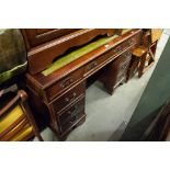 A MAHOGANY ENGLISH PEDESTAL DESK WITH INSET LEATHER TOP, EIGHT DRAWERS