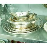 THREE ELECTROPLATE OVAL VEGETABLE DISHES AND A SET OF FOUR EP GRADUATED OVAL MEAT DISHES AND THREE