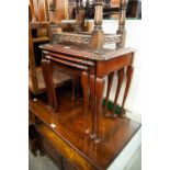 NEST OF THREE MAHOGANY COFFEE TABLES