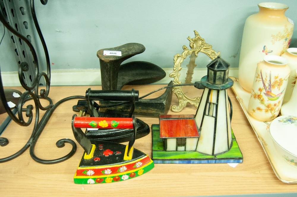 A WROUGHT IRON STAND, TWO FIRE IRONS, LIGHT HOUSE TABLE LAMP AND A PICTURE FRAME