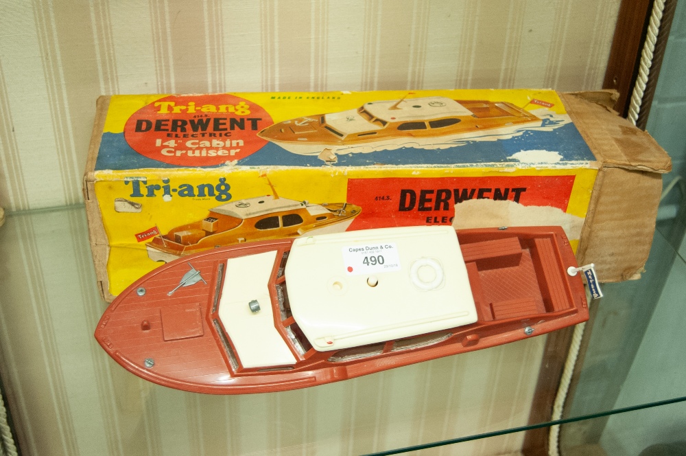 A BOXED CIRCA 1950's TRI-ANG 'DERWENT' PLASTIC BATTERY POWERED MODEL CABIN CRUISER