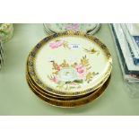 A SET OF EARLY TWENTIETH CENTURY PAINTED DESSERT PLATES WITH YELLOW GROUND AND HAND PAINTED FLOWERS,