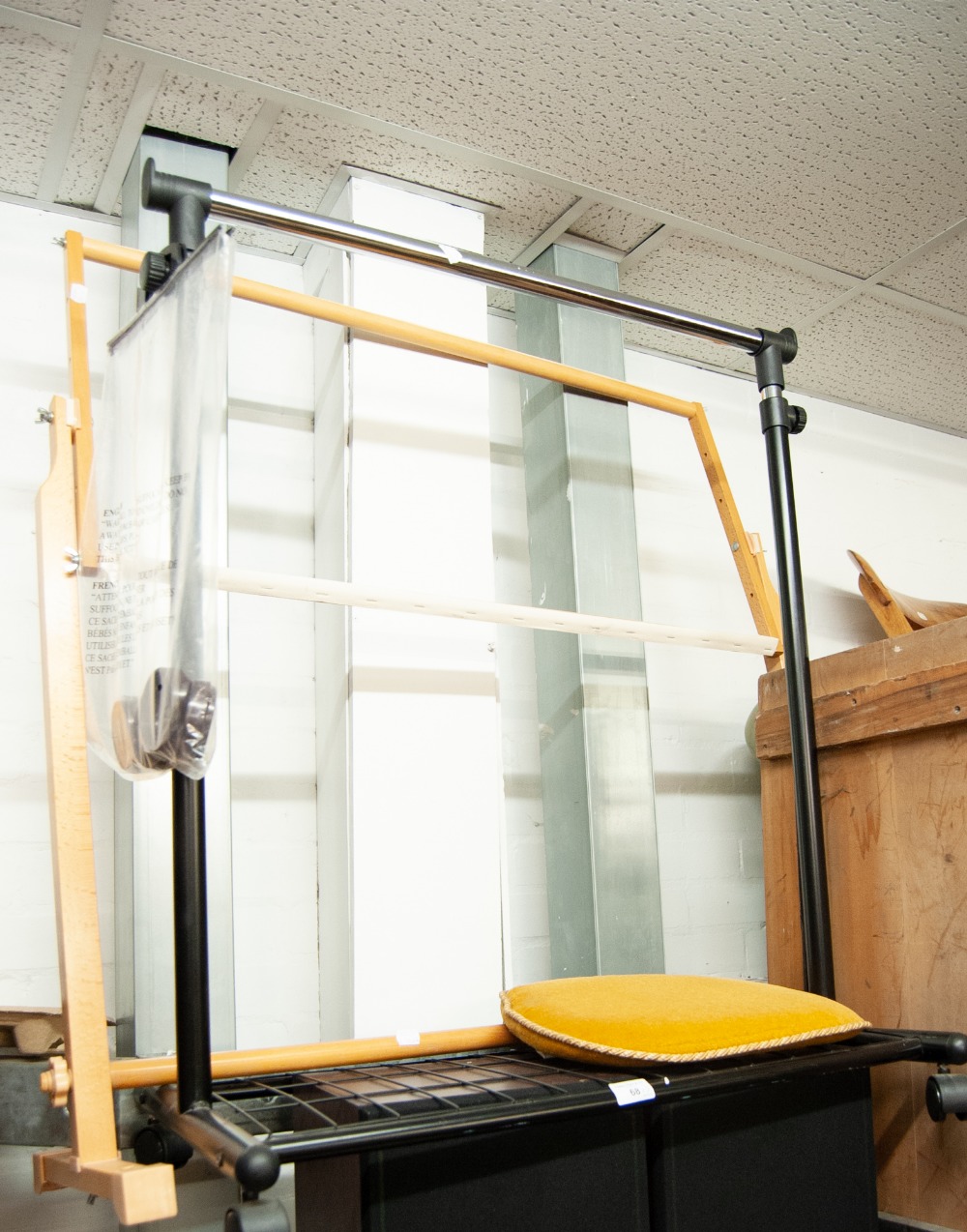 A MODERN CHROME CLOTHES RAIL AND A MODERN WEAVING FRAME (2)