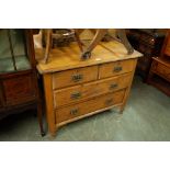 A LATE VICTORIAN STRIPPED PINE CHEST OF TWO SHORT AND TWO LONG DRAWERS